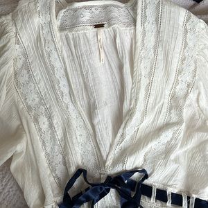 Free People romantic blouse size S (can fit medium)